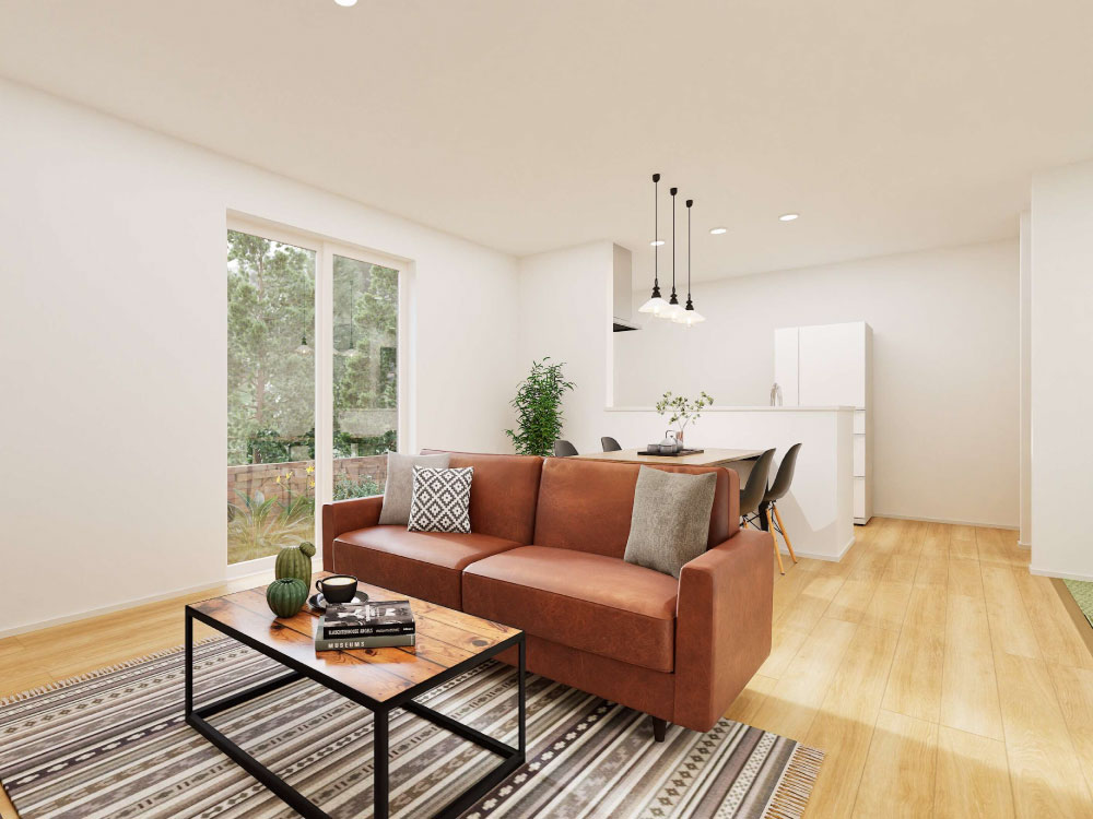 【完成予想図(内観)】南側の大きな窓から光がたっぷり差し込むLDK。日中は照明いらずの明るさで、家族が自然と集まる心地よい空間です。ぬくもりを感じながら、穏やかな時間を過ごせます。